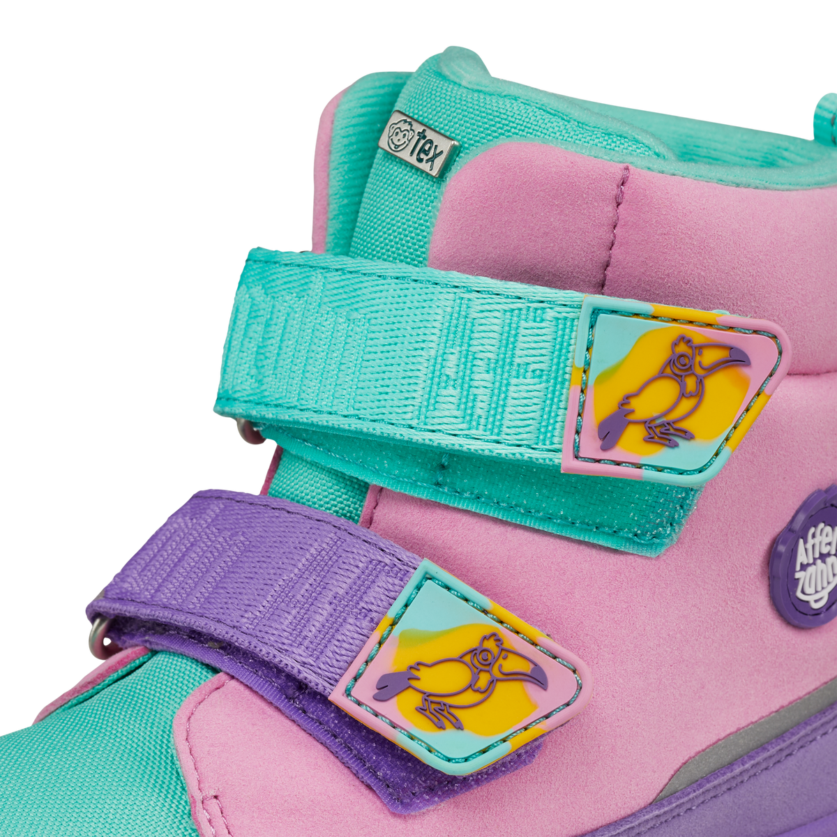 Affenzahn Winter Boot Vegan Comfy i varianten Creative Toucan med pastelfarver, justerbare stropper og farverig tukanillustration. Børnestil i lyserød og turkis.