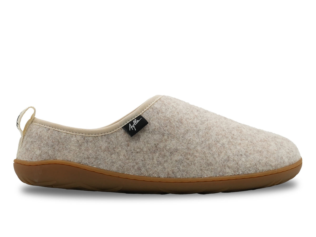Aylla Wasi II barfodshjemmesko i beige uldfilt, set fra ydersiden