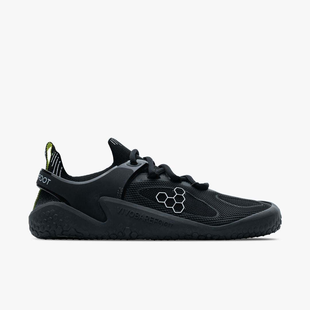 Vivobarefoot Motus Strength Womens i Obsidian / Grey. Barfodssko med tynd, grebsikker sål og åndbar mesh-overdel. Designet til træning med stabil, teknisk understøttelse.