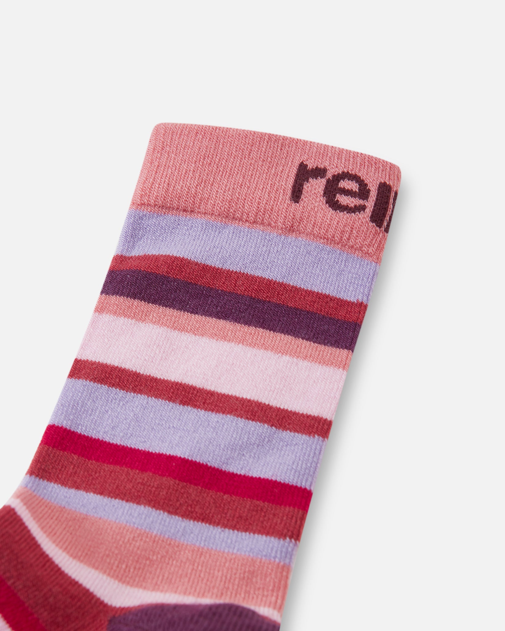 Reima Parit uldsokker til børn i Rose Blush, nærbillede af skaftet med Reima-logo
