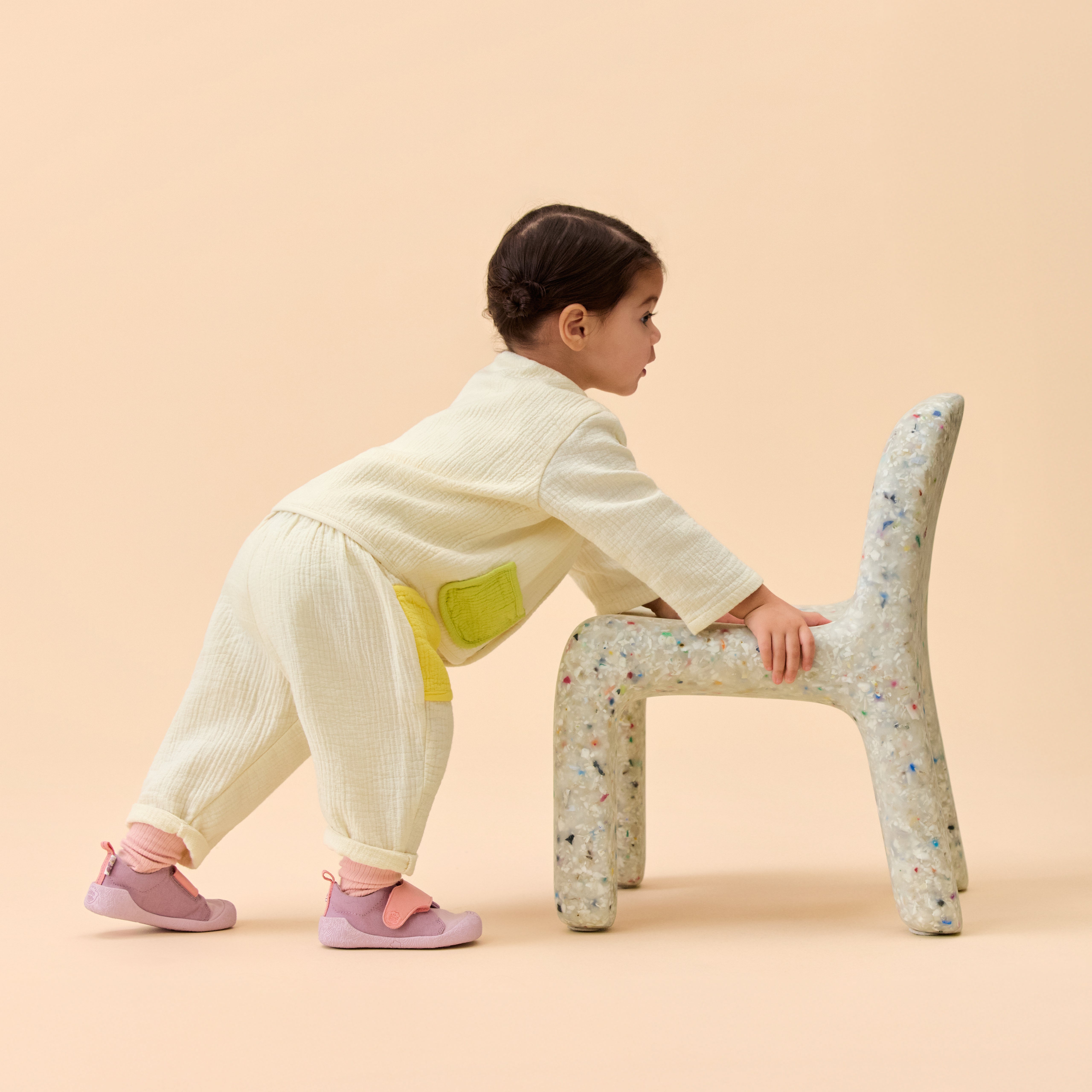 Toddler model wearing Affenzahn Prewalker Cotton Smally Otter