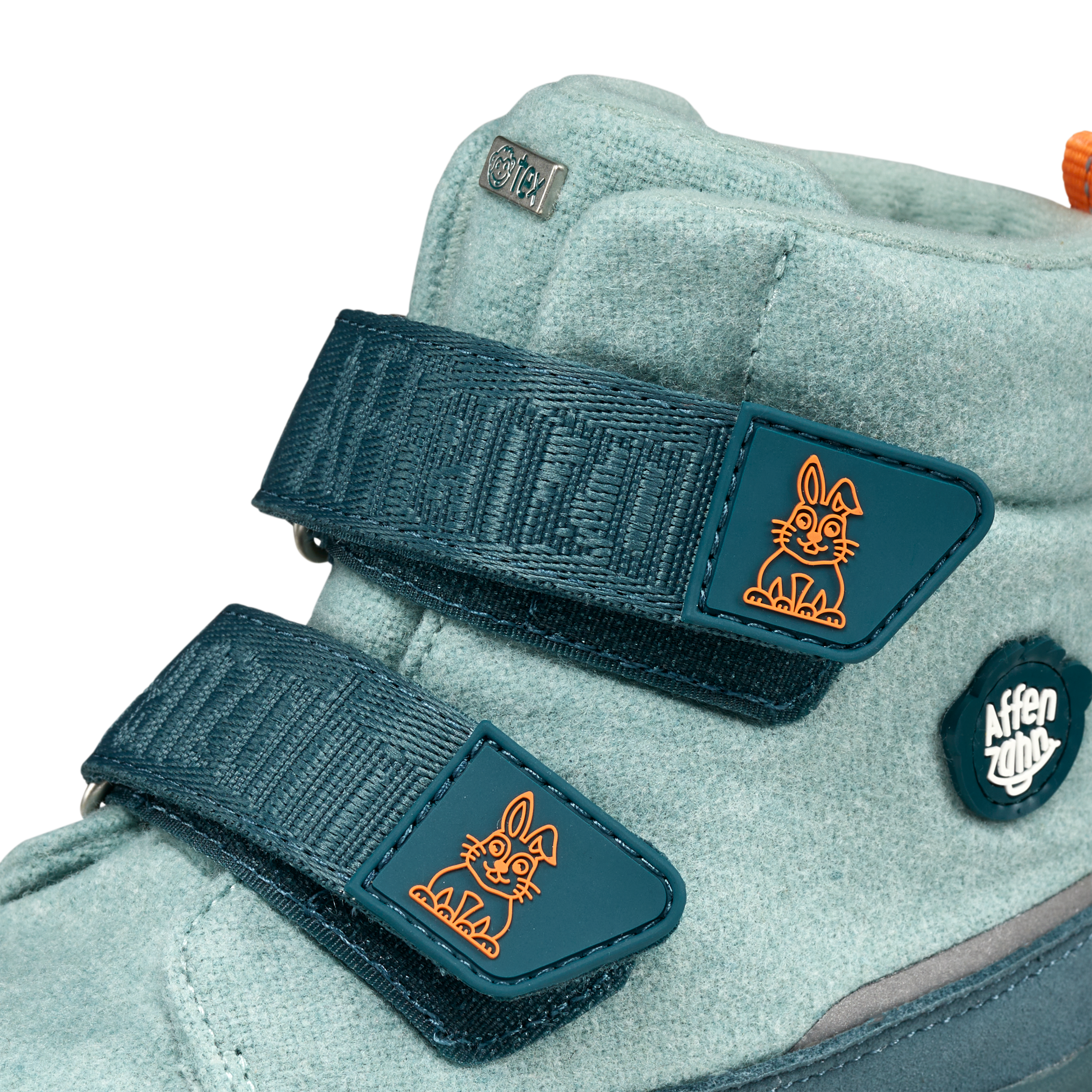 Affenzahn Winter Boot Wool Comfy in Rabbit variant med lys teal farve, dobbelt velcrolukning med orange kaningrafik. Ideel til børn til vinterbrug.