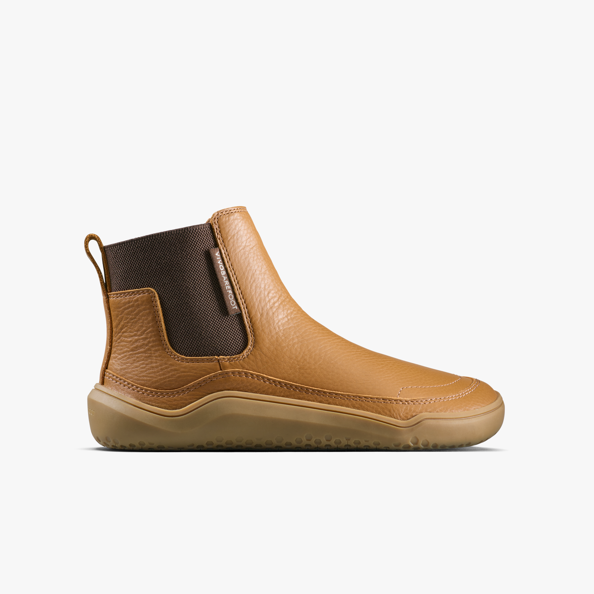Vivobarefoot Gobi Chelsea Juniors barfodsstøvle til børn i lysebrunt Acorn-læder, set fra ydersiden