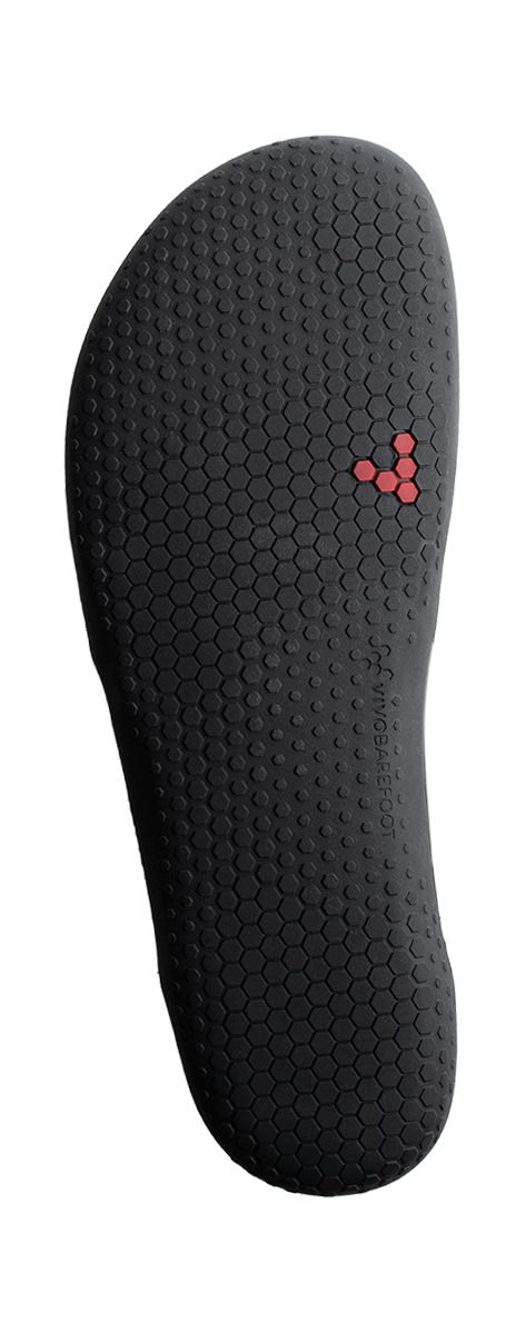 Sål af Vivobarefoot Gobi Lux i Obsidian, designet til at fremme naturlig fodbevægelse med en tekstureret hexagonal mønster for forbedret greb.