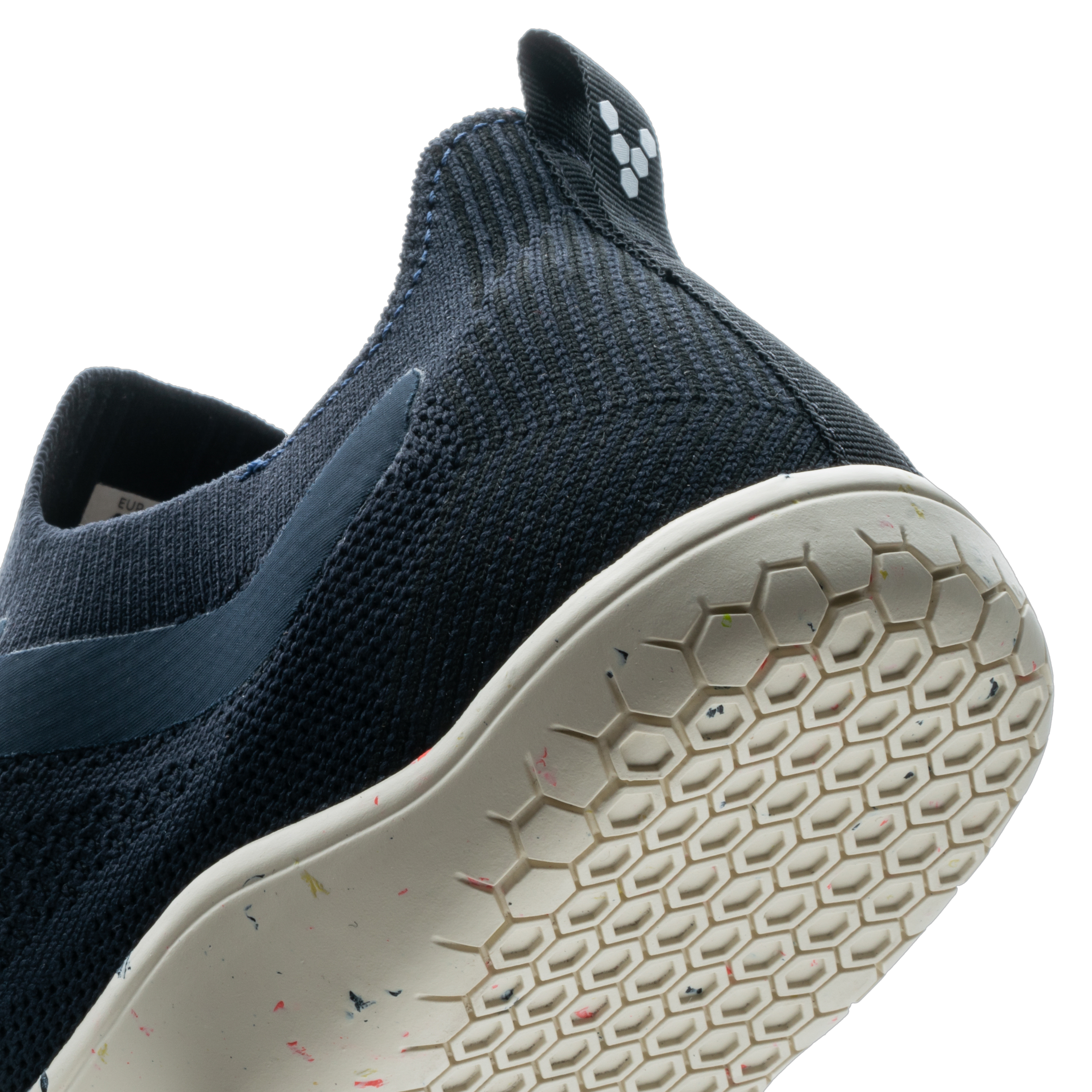 Barfodssko, Vivobarefoot Primus Lite Knit Mens i varianten Midnight, viser den karakteristiske strikkede overdel i mørkeblå og en tynd, fleksibel ydersål med hexagonal mønster.