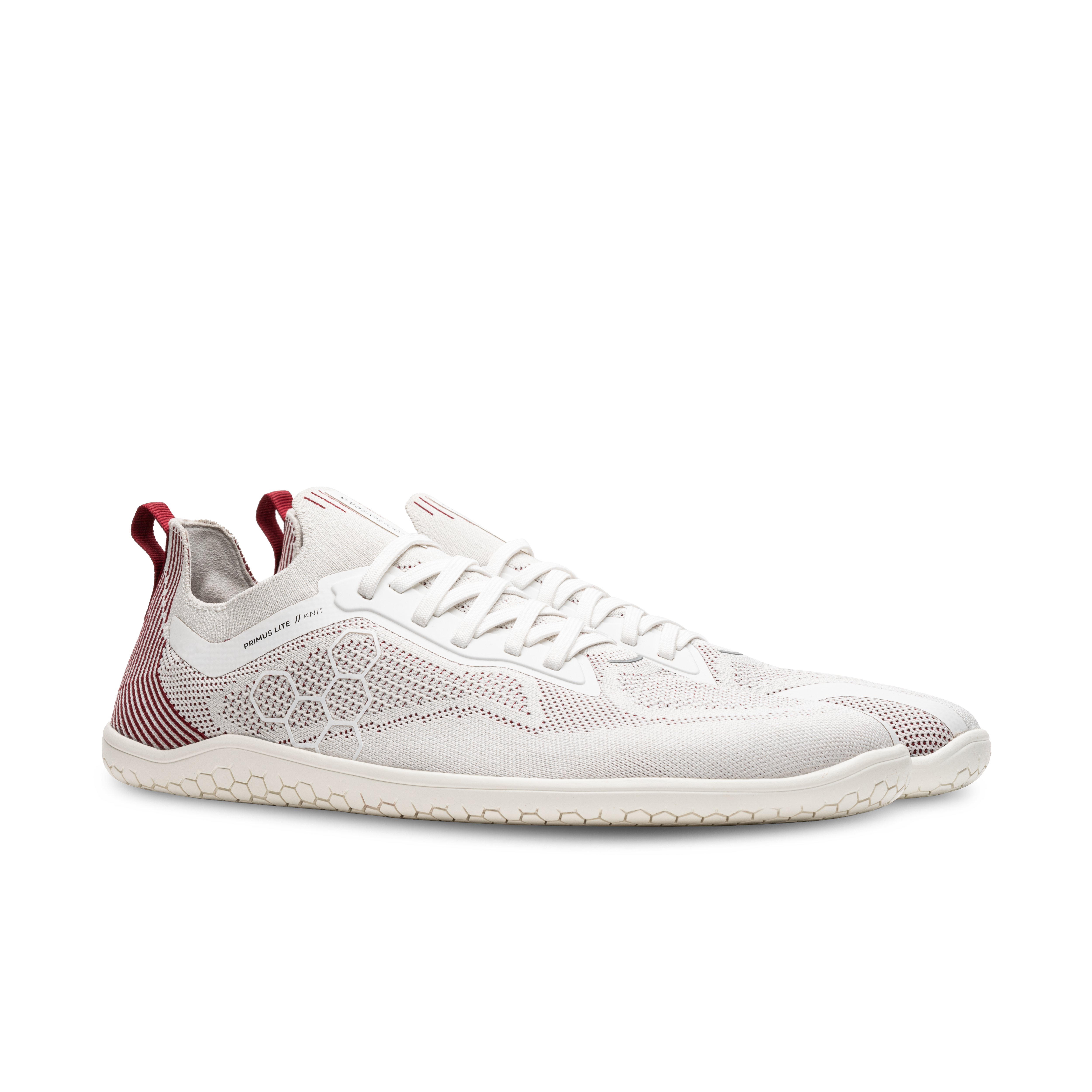 Vivobarefoot Primus Lite Knit i varianten Off White / Burgundy, let barfodssko til kvinder med åndbart strik og tynd, fleksibel sål for en naturlig gang.