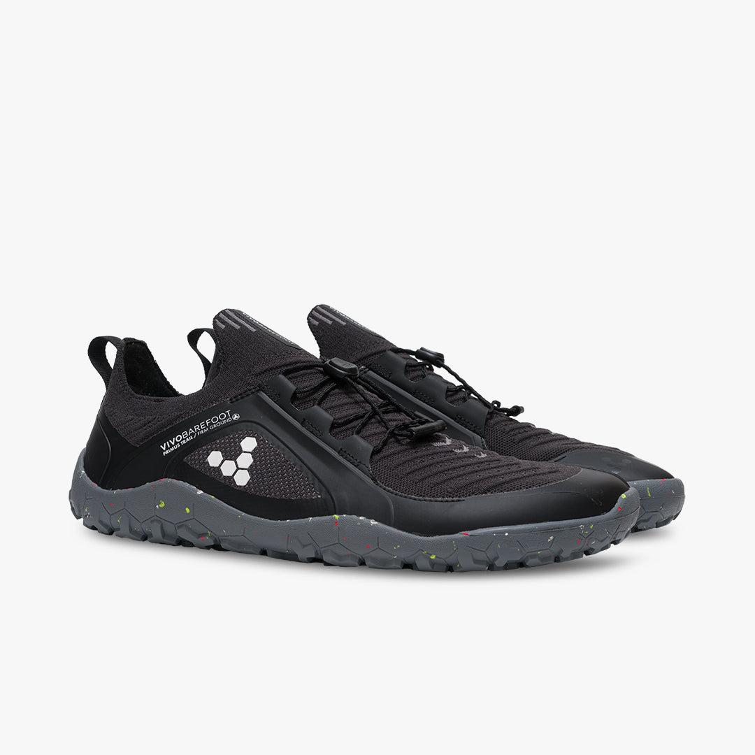 Vivobarefoot Primus Trail Knit FG Mens i Obsidian/Grey. Barfodet fodtøj med tæt mesh-overdel og speckled ydersål for greb på stier.