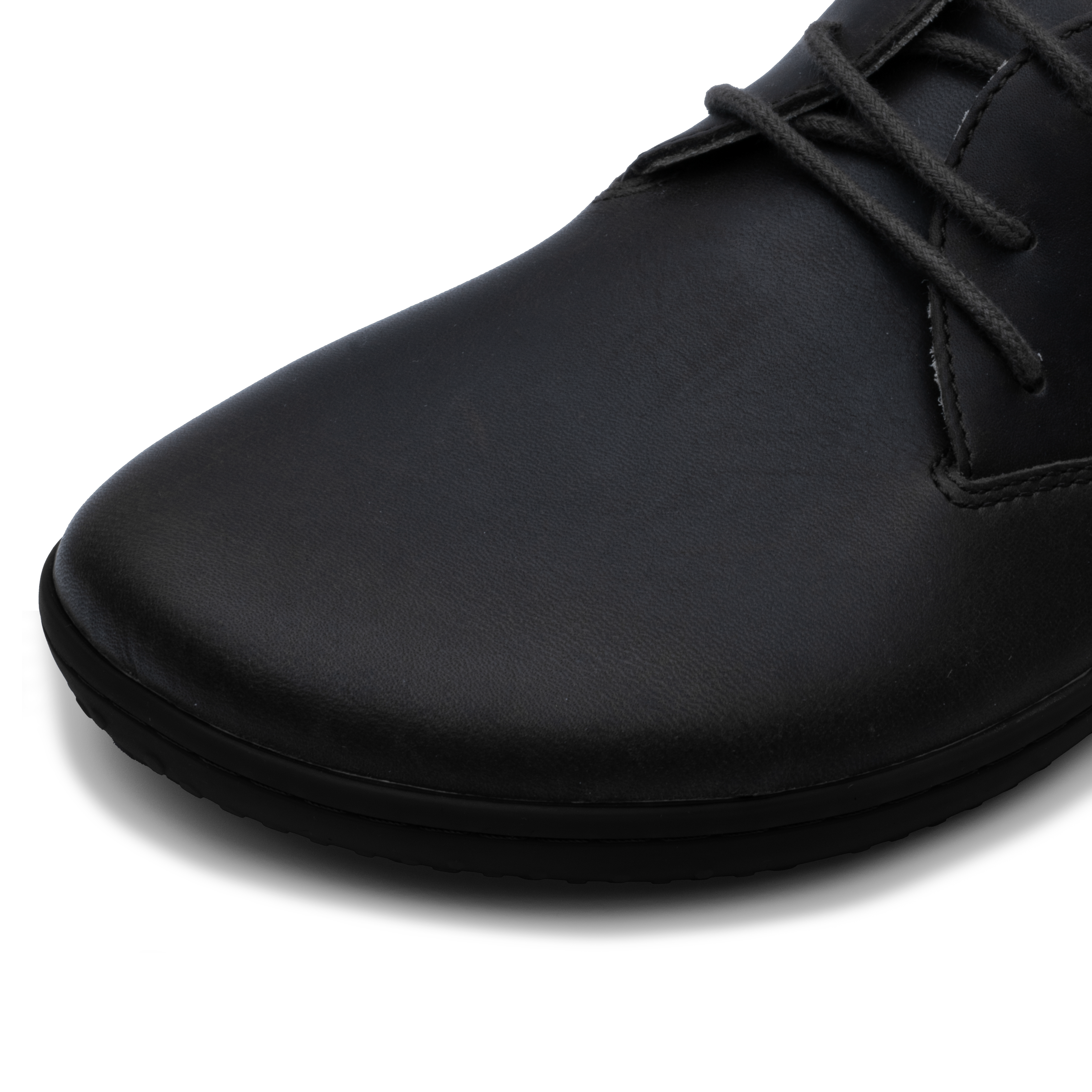 Vivobarefoot Ra IV herresko i varianten Obsidian, viser forsiden og siden uden for. Skoen fremhæver barfodsdesign med en glat, sort vildtlæderoverdel og flade, fleksible såler.