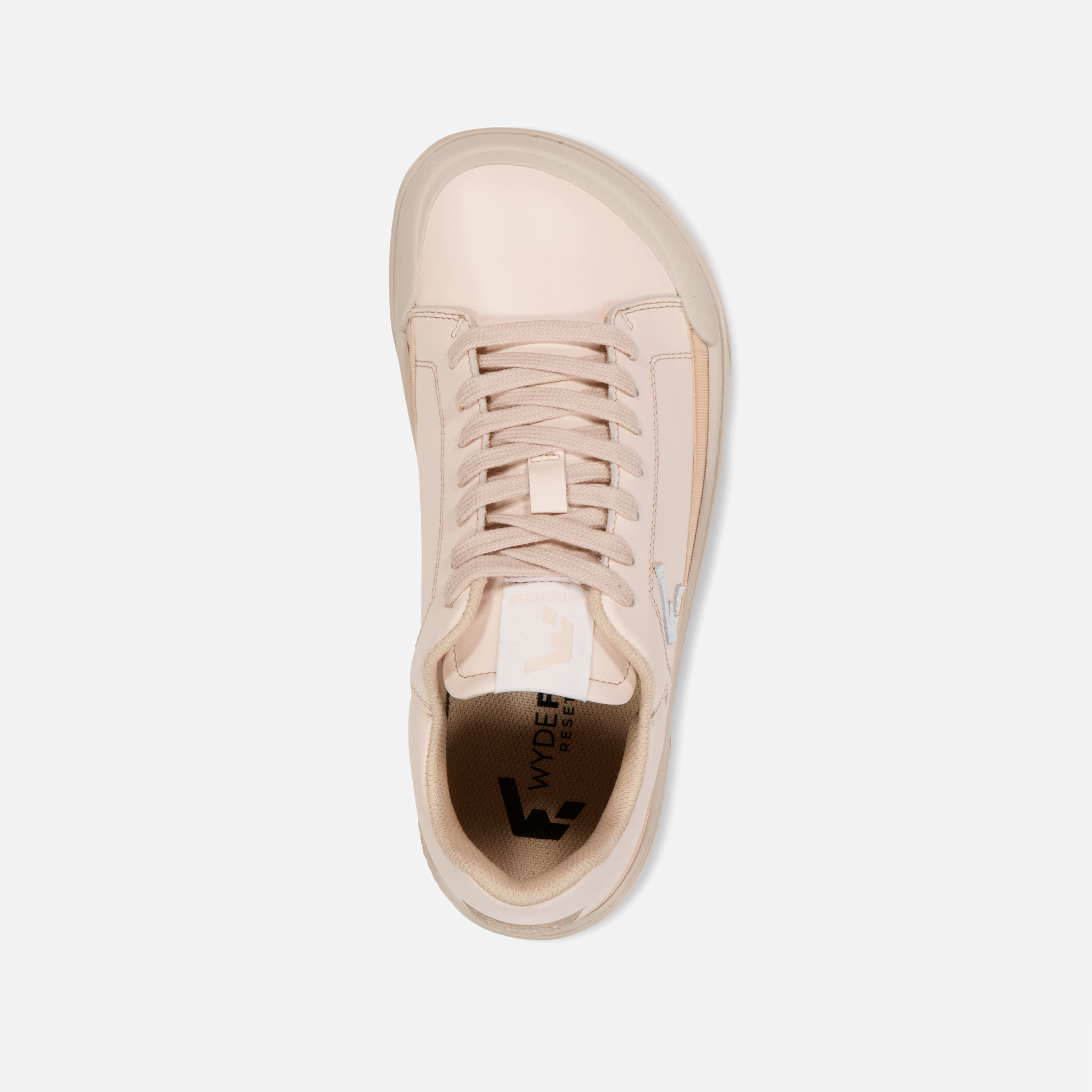 Wyde Arcus sneaker set i Peach variant med en let ferskenfarve. Skoen har matchende snørebånd og en lidt mørkere sål, set fra oven.