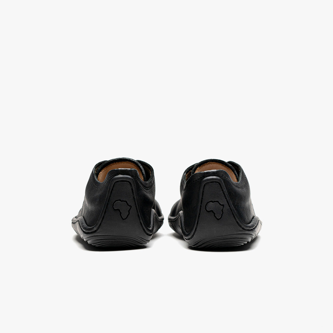 Vivobarefoot Addis School Kids barfods sneakers til børn i farven obsidian, bagfra