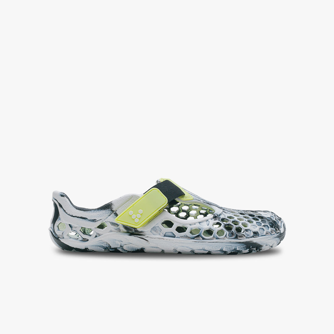 Vivobarefoot Ultra Bloom Juniors barfods vandsko til teenager i farven obsidian-white, yderside